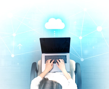 Header image with laptop and cloud